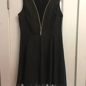 Black dress with metallic gold accents